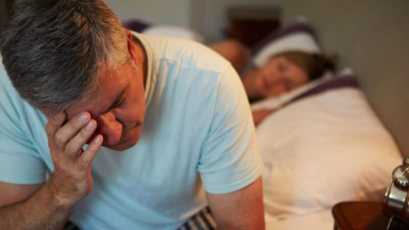 Man with insomnia, despite the importance of sleep