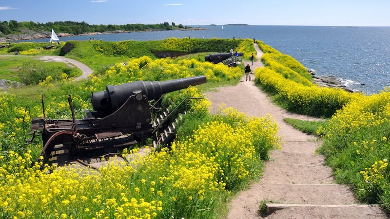 Helsinki’s Suomenlinna Fortress – built by the Swedes in the 1700s as a bulwark against Russia’s rising power in the Baltic – is today a popular park sprinkled with picnic spots, footpaths, and old fortifications. Used with “Helsinki and Tallinn: Pearls of the Baltic.” CREDIT: Rick Steves.