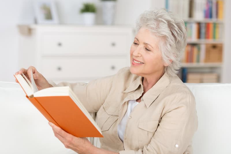 woman reading, used in What's Booming June 13 announcement of book readers' choice voting