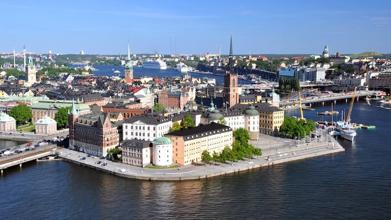 The reward for climbing the 348-foot-tall City Hall tower is a classic Stockholm view of the historic quarter of Gamla Stan, with the rest of the green and watery city spread out around it. (Cameron Hewitt, Rick Steves‚Äô Europe) - Sweden spans the ages, with modern amenities and a rich history.