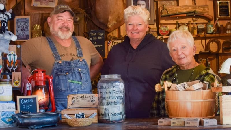 Jill Curtis, center, with husband Todd and mother Sally in their Deadwood shop - photo Nick Thomas