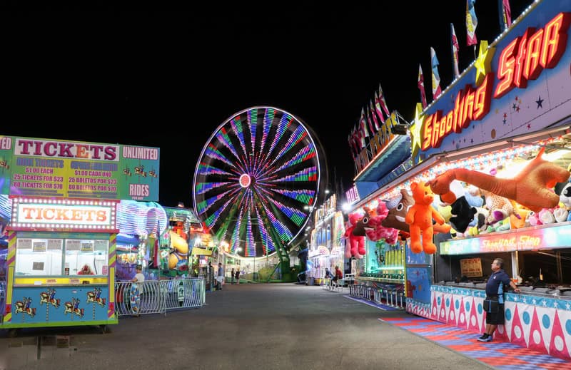 A state fair midway at night. Used with What's Booming: September 26 +