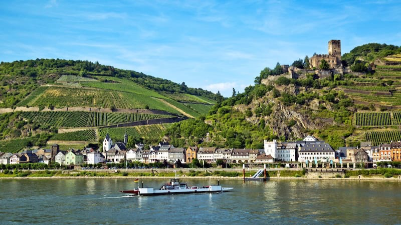 A Rhine River ferry shuttles passengers to the town of Kaub, in the shadow of Gutenfels Castle. CREDIT: Rick Steves Europe