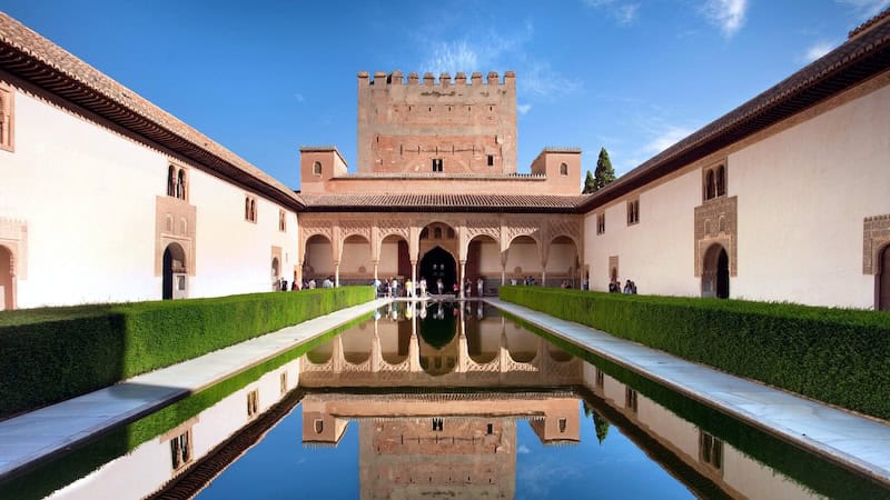 The Courtyard of the Myrtles at Alhambra in Granada features a pool lined by fragrant myrtle hedges. (Dominic Arizona Bonuccelli, Rick Steves' Europe)