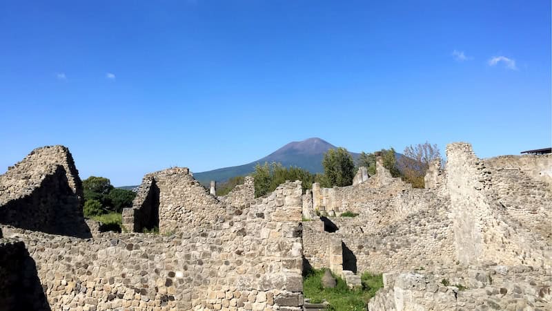 Mount Vesuvius, a still-active volcano, looms over the ruins of Pompeii. (Orin Dubrow, Rick Steves&apos; Europe)