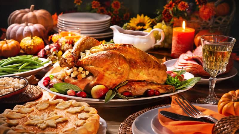 Turkey dinner feast for Thanksgiving or Christmas. By Alexander Raths, used with What's Booming November 27