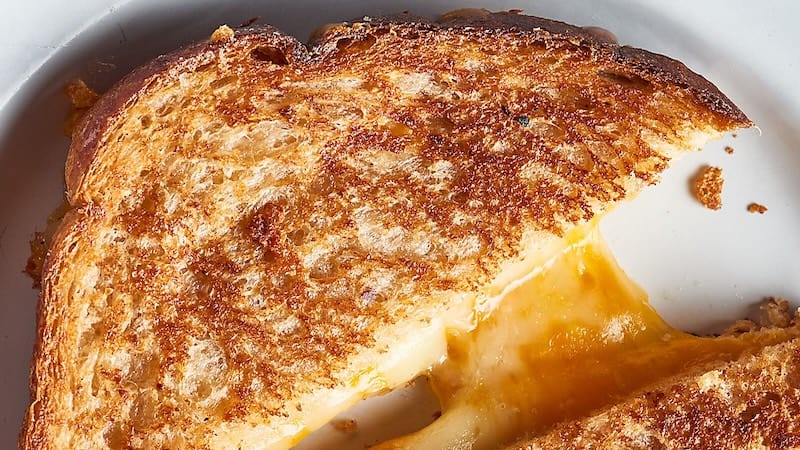 Air fryer grilled cheese sandwiches are incredibly easy to make. They’re golden, gooey, and absolutely foolproof.