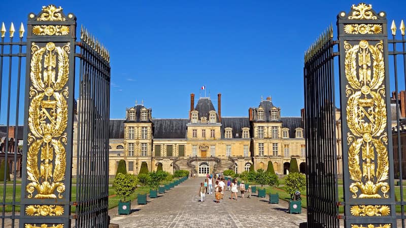 Châteaux Day Trips from Paris: Napoleon gave his famous abdication speech on the stairs of Fontainebleau, a chateau bursting with eclectic artistic styles. (Rick Steves, Rick Steves' Europe)