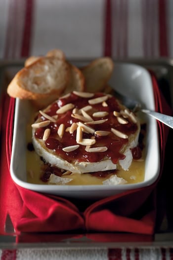 Baked Brie is always a big hit at parties, along with other easy holiday appetizers. (Noel Barnhurst/TCA)