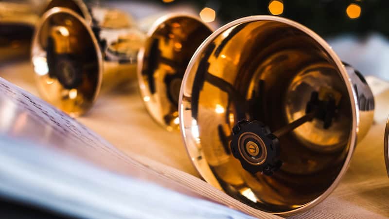 Handbells for a choir, noting the holiday events in What's Booming December 5 to 12