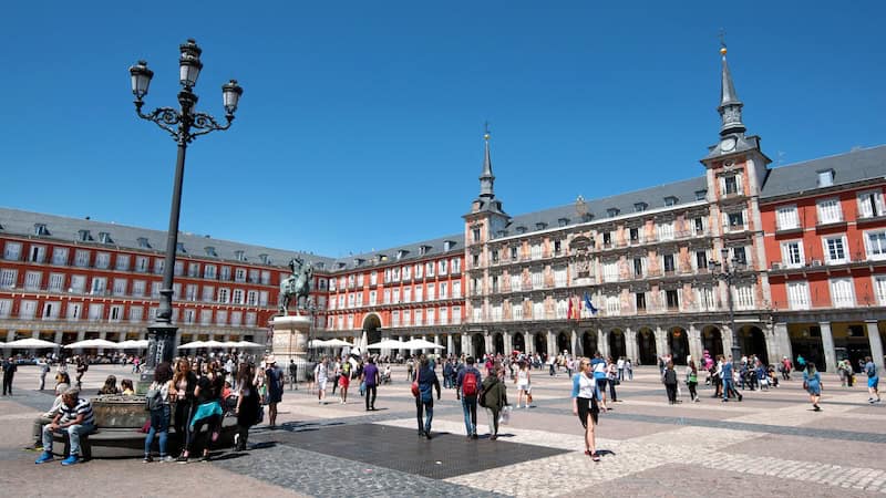 Madrid’s cobbled Plaza Mayor has seen centuries of history, from bullfights to carnival celebrations to gruesome events of the Inquisition. Start exploring from Puerta del Sol to see Madrid’s Royal Palace, the Plaza Mayor, and the Prado Museum. CREDIT: Cameron Hewitt, Rick Steves’ Europe.