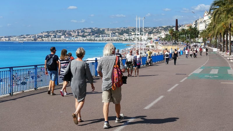 Walk the Promenade des Anglais in the sun-drenched city of Nice, France, to admire the azure Mediterranean and watch Europeans at play. (Rick Steves, Rick Steves&apos; Europe)