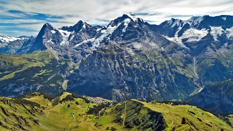 Trails and lifts in Switzerland’s Berner Oberland lead to magnificent views of the region’s star attractions: (from left) the Eiger, Mönch, and Jungfrau mountains, among the breathtaking wonders on a Swiss Alps hike. CREDIT: Dominic Arizona Bonuccelli, Rick Steves’ Europe.