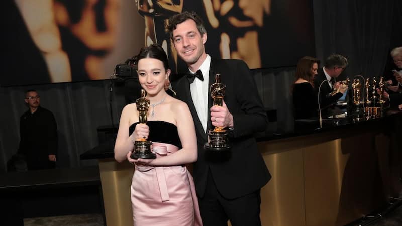 HOLLYWOOD, CALIFORNIA - MARCH 02: (L-R) Mikey Madison and Alex Coco, winners of Best Actress in a Leading Role and Best Picture for "Anora," attend the 97th Annual Oscars Governors Ball at Ovation Hollywood Complex on March 02, 2025 in Hollywood, California. (Photo by Monica Schipper/Getty Images)