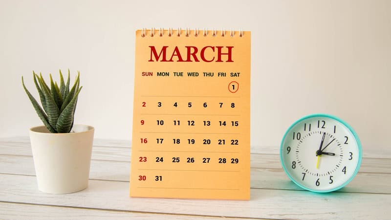 March calendar with clock and potted plant, for use with March: The Harebrained Month. Image by Zolak Zolak.